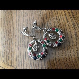 Round textured earrings with red and green stones